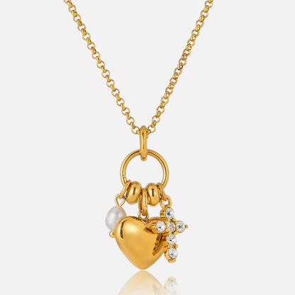 Collier doré cœur perle et croix strass - vue rapprochée